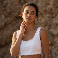 Thumbnail for Model wearing a Rainbow Choker from Brother & Sisters, featuring colorful enamel beads on a gold chain.