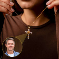 Thumbnail for Cross Photo Necklace held by a woman, showcasing customizable photo projection, brand Brother & Sisters.
