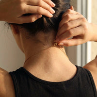Thumbnail for Minimalist Name Necklace being fastened at the nape, clasp and chain visible | SKU: minimalistnn-gold