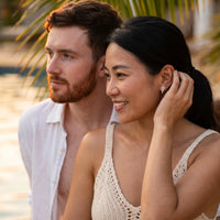 Thumbnail for Woman gently touching her silver stud earrings | SKU: 42008-silver
