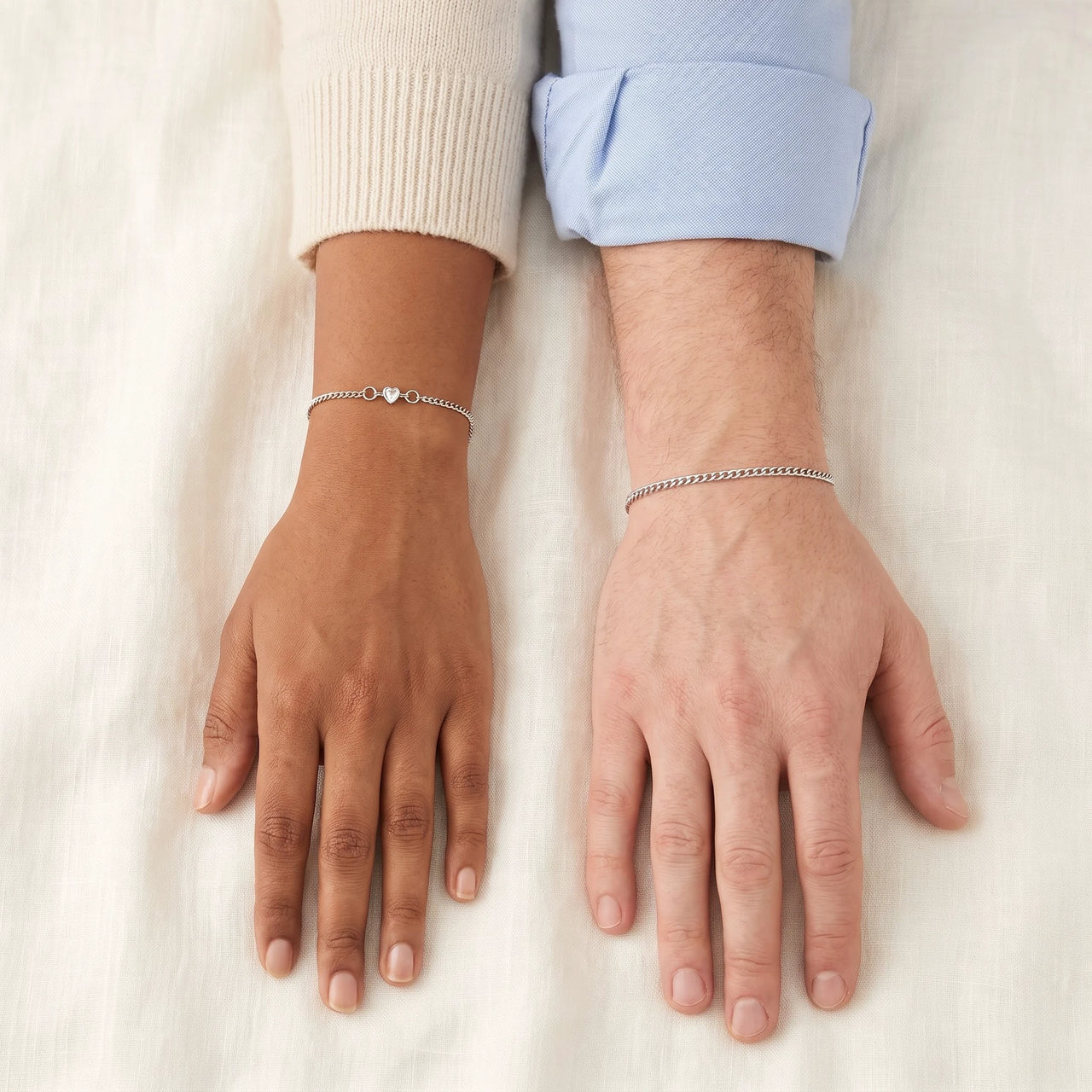 Heart Bond Matching Bracelet Set in Silver — worn by a couple, wrists side by side