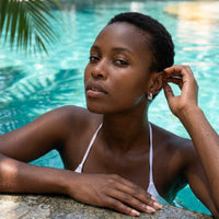 Thumbnail for Chunky Dome Hoops in Silver, worn by a tropical pool | SKU: 41005-silver