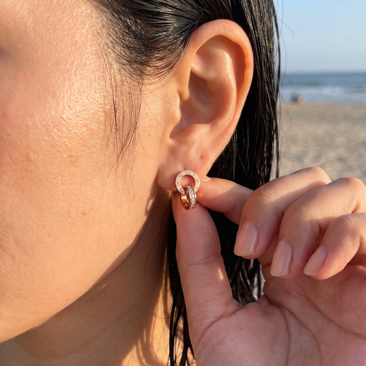 Rose gold huggie hoop earrings worn, showing its real size | SKU: 11137578-rose-gold