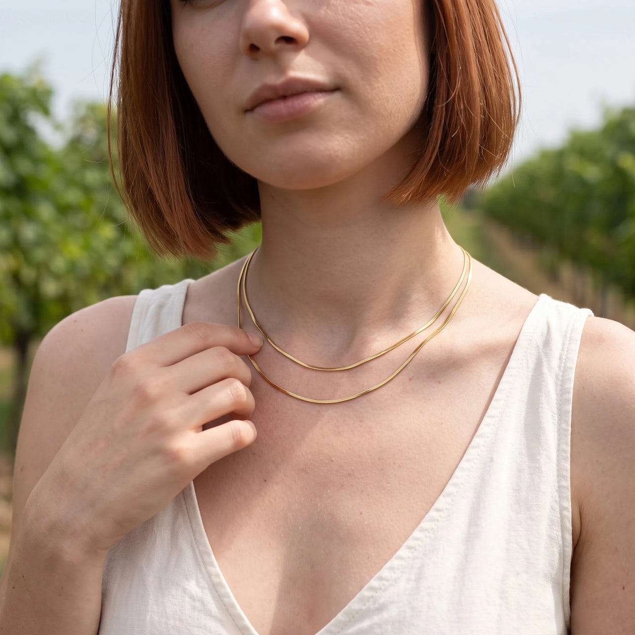 Layered necklace — worn, everyday gesture, gold | SKU: lesimplenecklace
