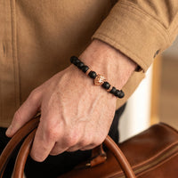 Thumbnail for Rose Gold Lion & Black Stones Bracelet – close-up worn on a man's wrist | Brother & Sisters | SKU: 20712286-rose-gold-XS-14-15, 20712286-rose-gold-S-16-17, 20712286-rose-gold-M-18-19, 20712286-rose-gold-L-20-21, 20712286-rose-gold-XL-22-23