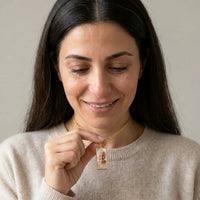 Thumbnail for Woman moved as she looks at her late grandmother's photo in the gold bar necklace | SKU: TPH-BARN-GOLD