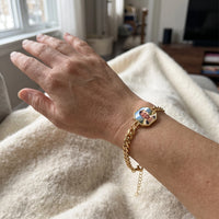 Thumbnail for The gold octagon photo bracelet on the wrist, showing the lobster clasp and extension chain | SKU: TPH-OCTB-GOLD-18