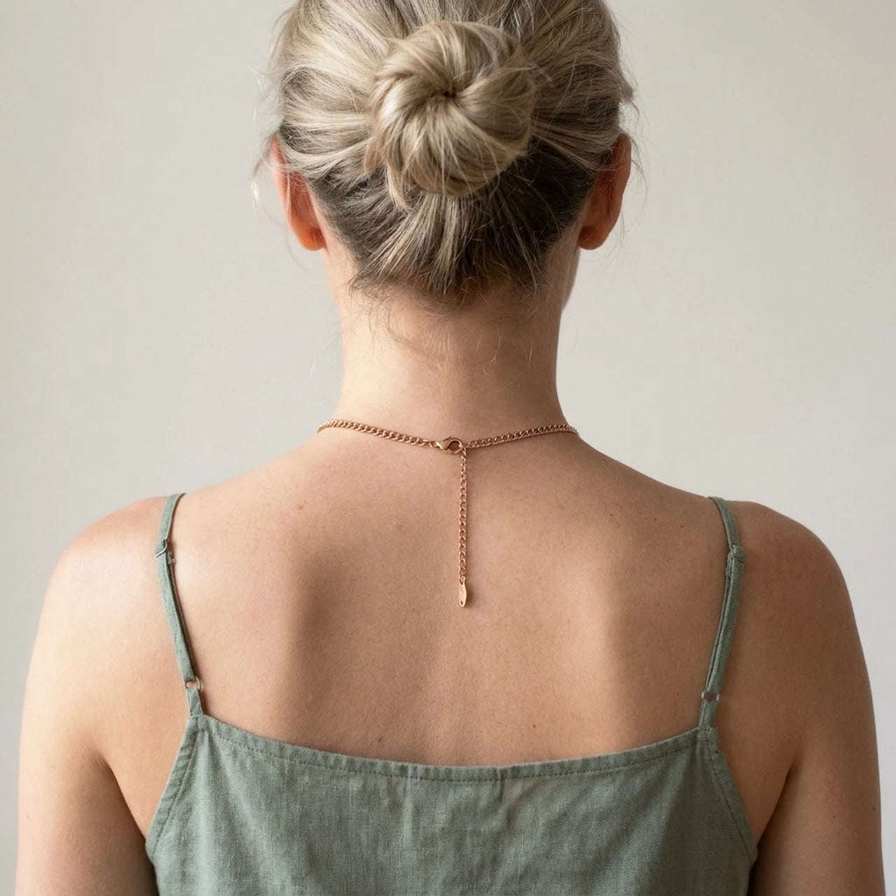 Back of the neck showing the lobster clasp and extension chain of the rose gold photo necklace | SKU: TPH-OVLN-ROSEGOLD