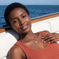 Thumbnail for Woman relaxing on holiday wearing the silver necklace | SKU: 505721